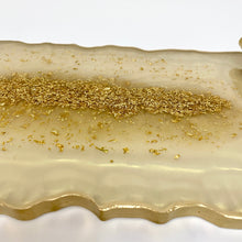 Load image into Gallery viewer, Cream and gold display tray with gold glitter to the central and finished with gold handles and gold edging.