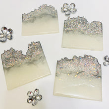 Load image into Gallery viewer, Wave-Shape Coaster Set Silver Sparkles - set of four